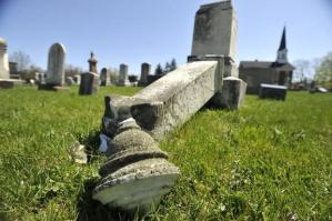 Marker damaged by vandals Credit: Nabill K. Mark/CDT